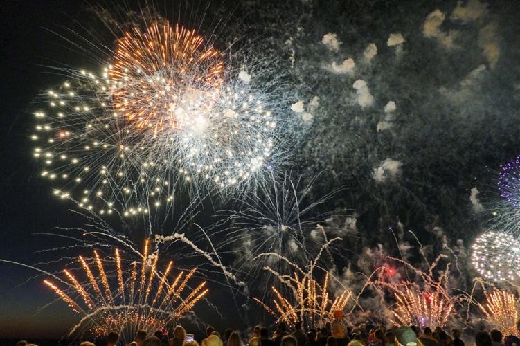Harborfest fireworks fill the sky over Oswego Harbor Arts and