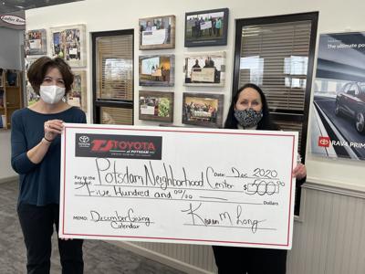 TJ Toyota gives to potsdam Neighborhood Center