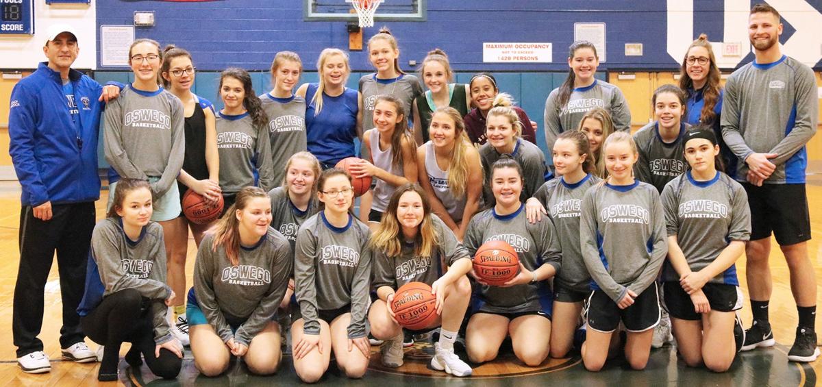 OHS girls JV, varsity basketball teams provide holiday help Community