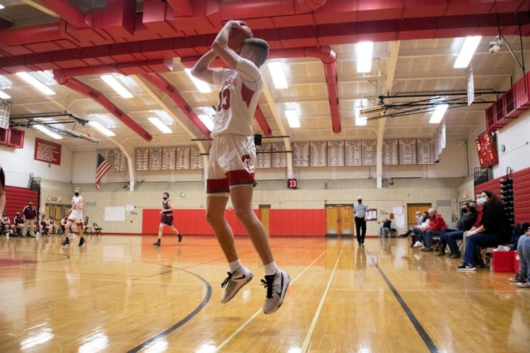 High school boys basketball Lowville dispatches Harrisville, 7938