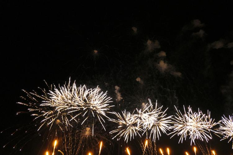 Harborfest fireworks fill the sky over Oswego Harbor Arts and