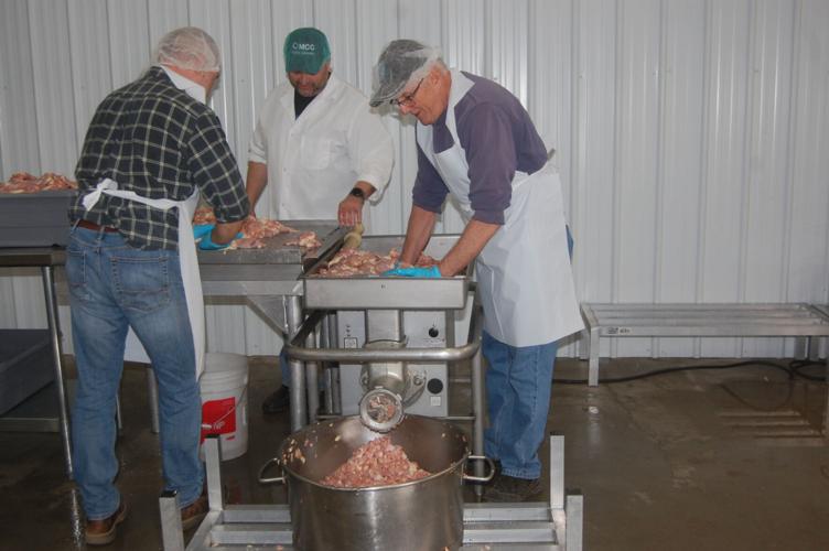 Many hands make light work as Mennonite meat canner comes to Lowville