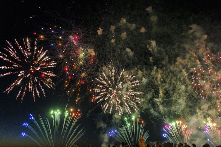 Harborfest fireworks fill the sky over Oswego Harbor Arts and