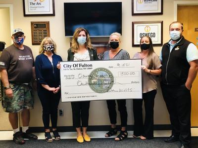 The city of Fulton makes $1,500 donation to Oswego Industries