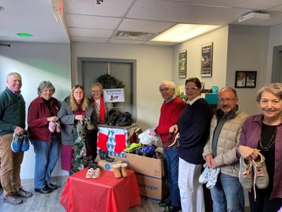 Barclay and local leaders gather to bless shoes