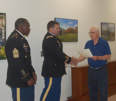 Soldier presented with key to the village