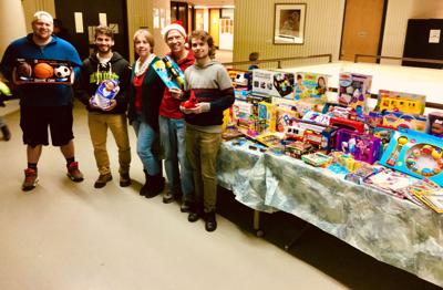 Dr. Jim’s Chemistry magic show helps holiday fund