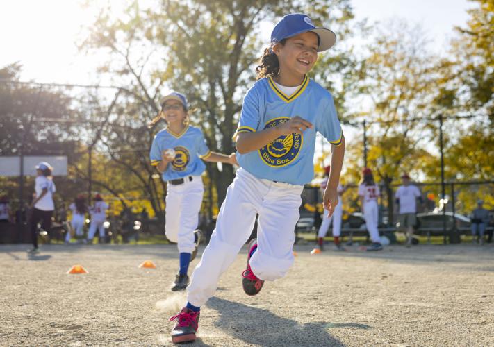 An all-girls baseball league aspires to keep girls in the male ...