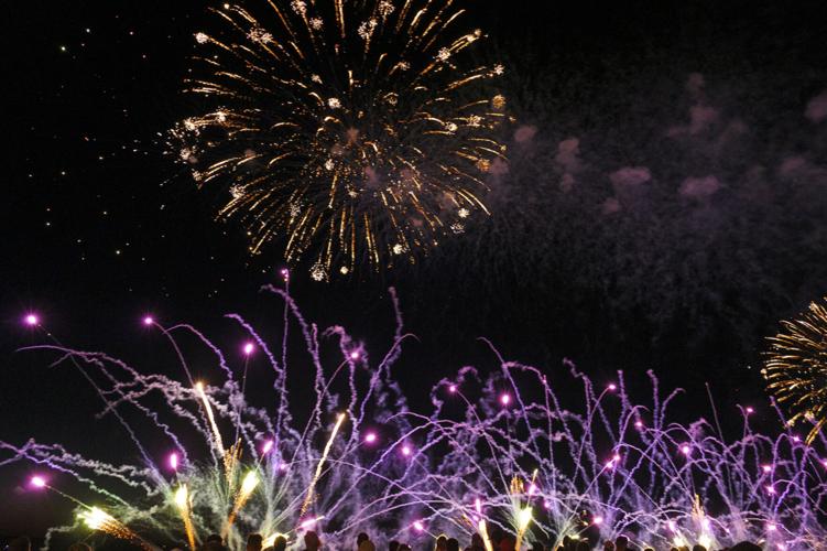 Harborfest fireworks fill the sky over Oswego Harbor Arts and