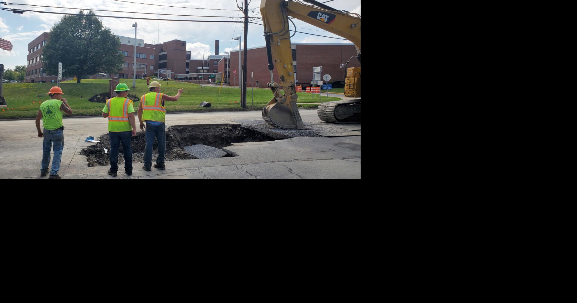 Water main break temporarily closes main road, hospital emergency room
