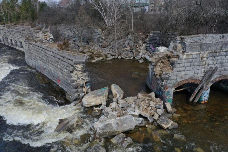 Remains of old Remington Paper Mill collapse into Black River