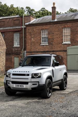 Strapped, wrapped and ready to defend! Land Rover Defender 90 is an upscale SUV.