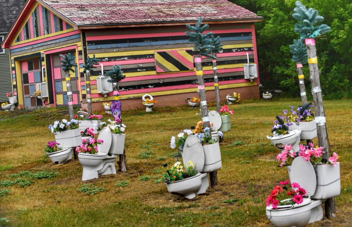 Owner of Potsdam toilet gardens, village reach undisclosed settlement