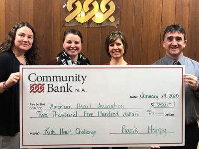 Community bank gives to AHA