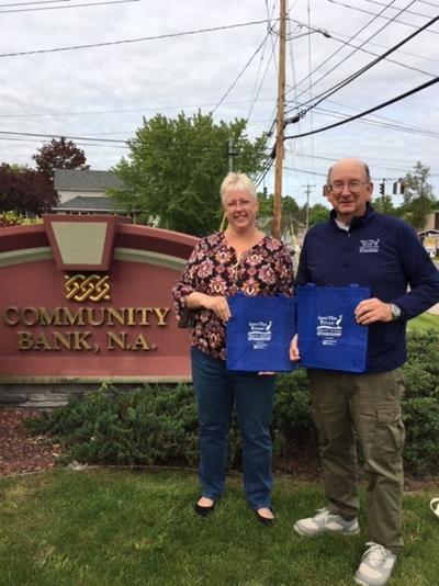 Community Bank helps save the river in bag effort