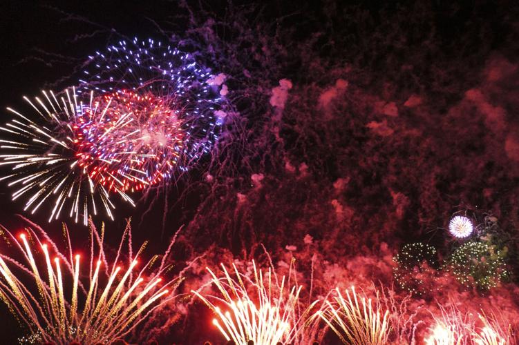 Harborfest fireworks fill the sky over Oswego Harbor Arts and