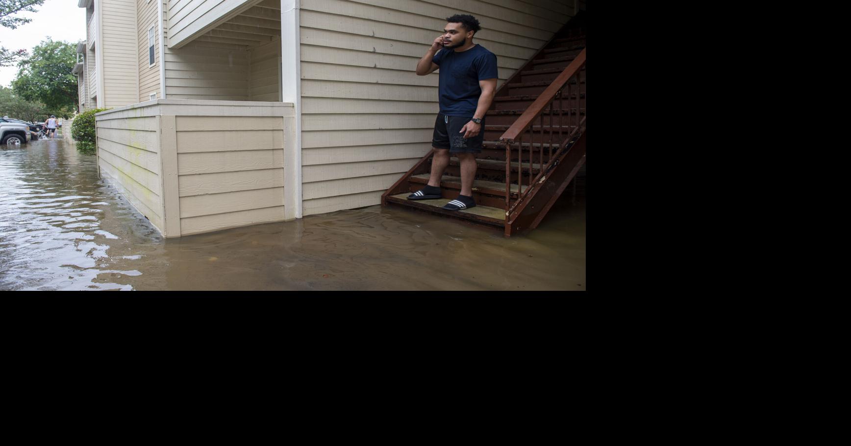 After heavy rains flood homes and businesses, soggy cleanup begins in ...