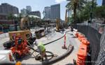 See repairs being made below the Canal Street sinkhole