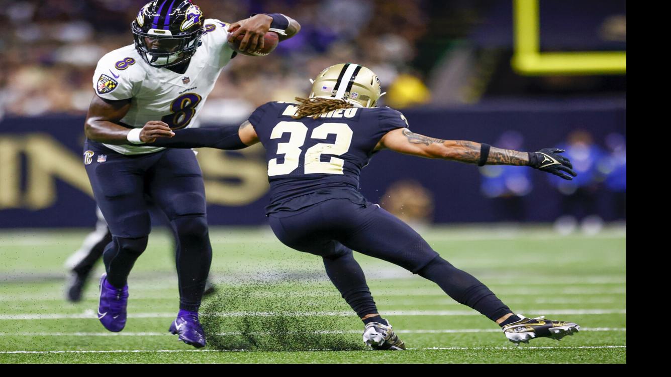 New Orleans, Louisiana,, November 7, 2022. New Orleans Saints safety Tyrann  Mathieu (32) tackles Baltimore Ravens quarterback Lamar Jackson (8) during  a National Football League game at Caesars Superdome in New Orleans