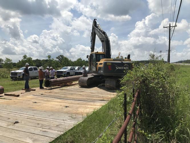 After brush with scary Comite River forecasts during Barry, interest in