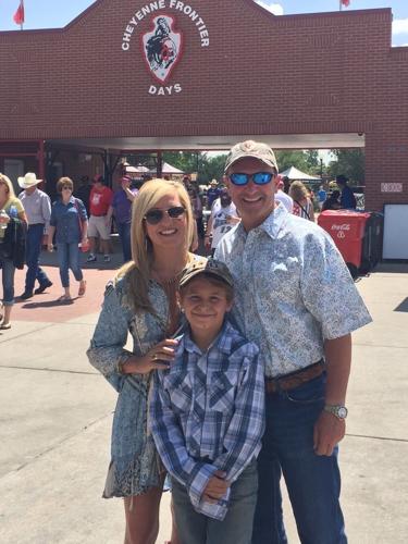 Jeff and Sharon Landry pose with JT