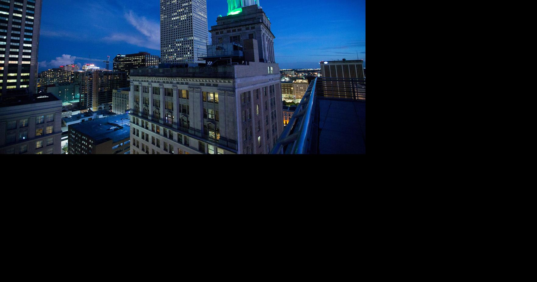 Colorful light displays make the 1920 Hibernia Tower a landmark in