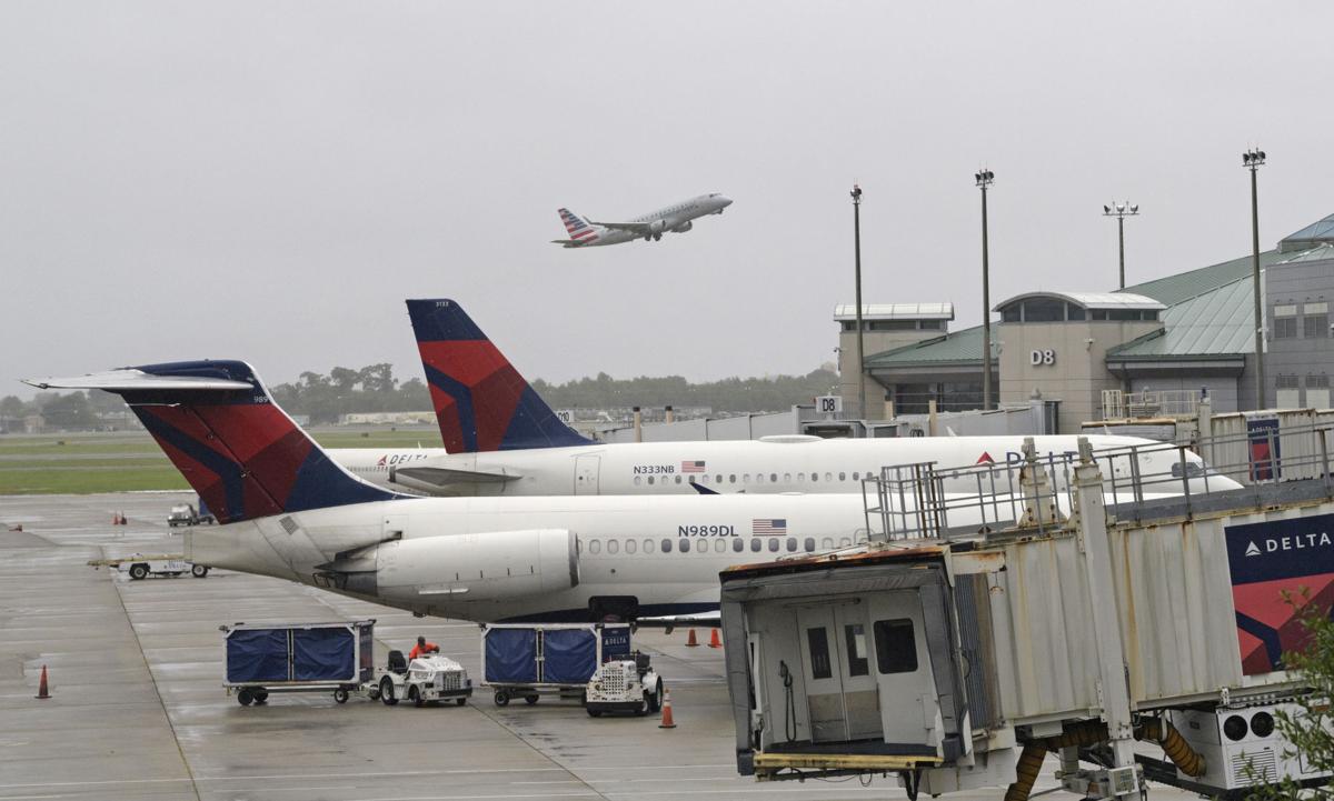 Louis Armstrong New Orleans airport faces long lines, widespread flight cancellations as storm ...