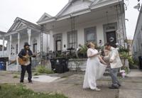 A coronavirus-era New Orleans wedding includes a cardboard family, beer waterfall and Zoom