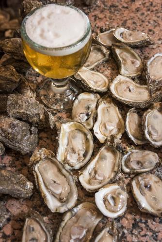 At the stand-up oyster bars of New Orleans, the best seats in the house