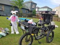 Street performer Mamie Marie Francois with her rolling disco tricycle