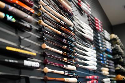 Marucci Sports bats on the wall