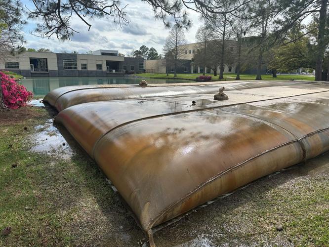Big hook, muck pulled from East Ascension 'pond jump' waters | Business ...
