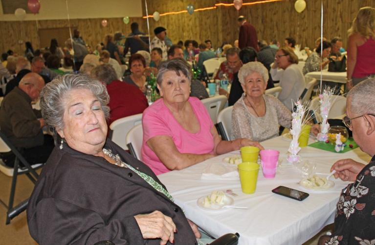 Westwego Police Chief Dwayne 'Poncho' Munch serves senior citizens