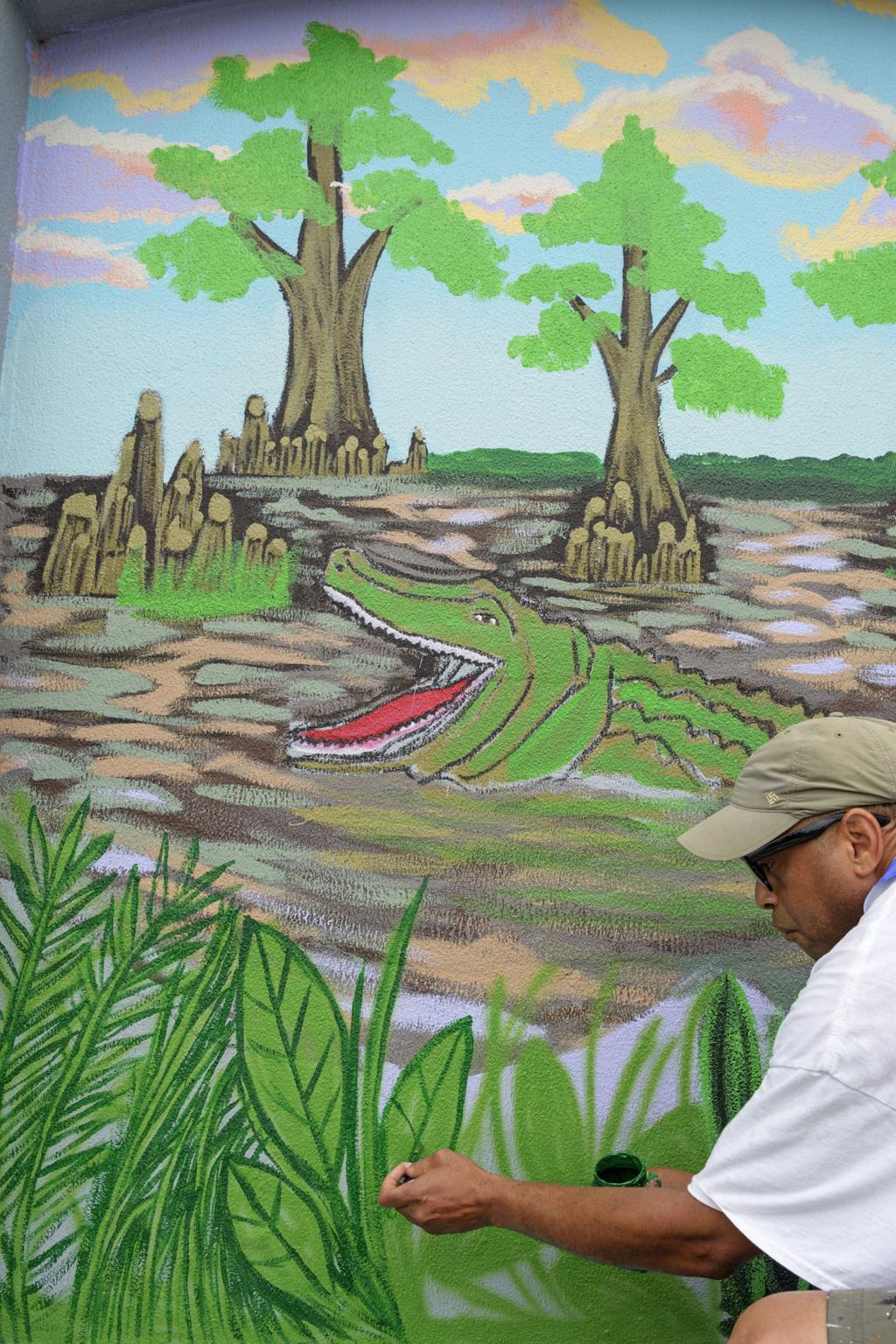 Sprucing Up A New Orleans Floodwall On Tchoupitoulas A Mile Long