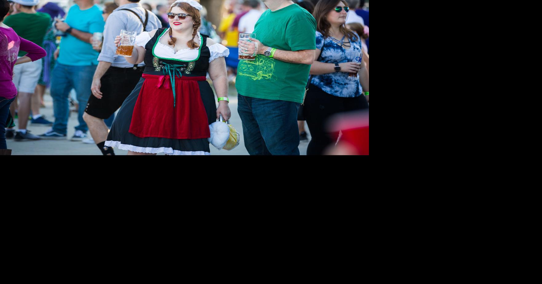 Photos Oktoberfest crowds revel in seasonal beer, weather at