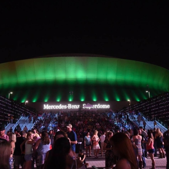 Superdome in Red - At night, Mercedes-Benz Superdome, the home stadium of  New Orleans Saints football team, is lit up by bright and colorful lights  Stock Photo - Alamy