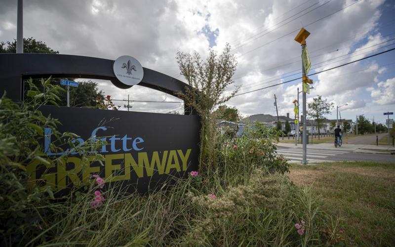 A holiday light show celebrates the Lafitte Greenway's new plaza and
