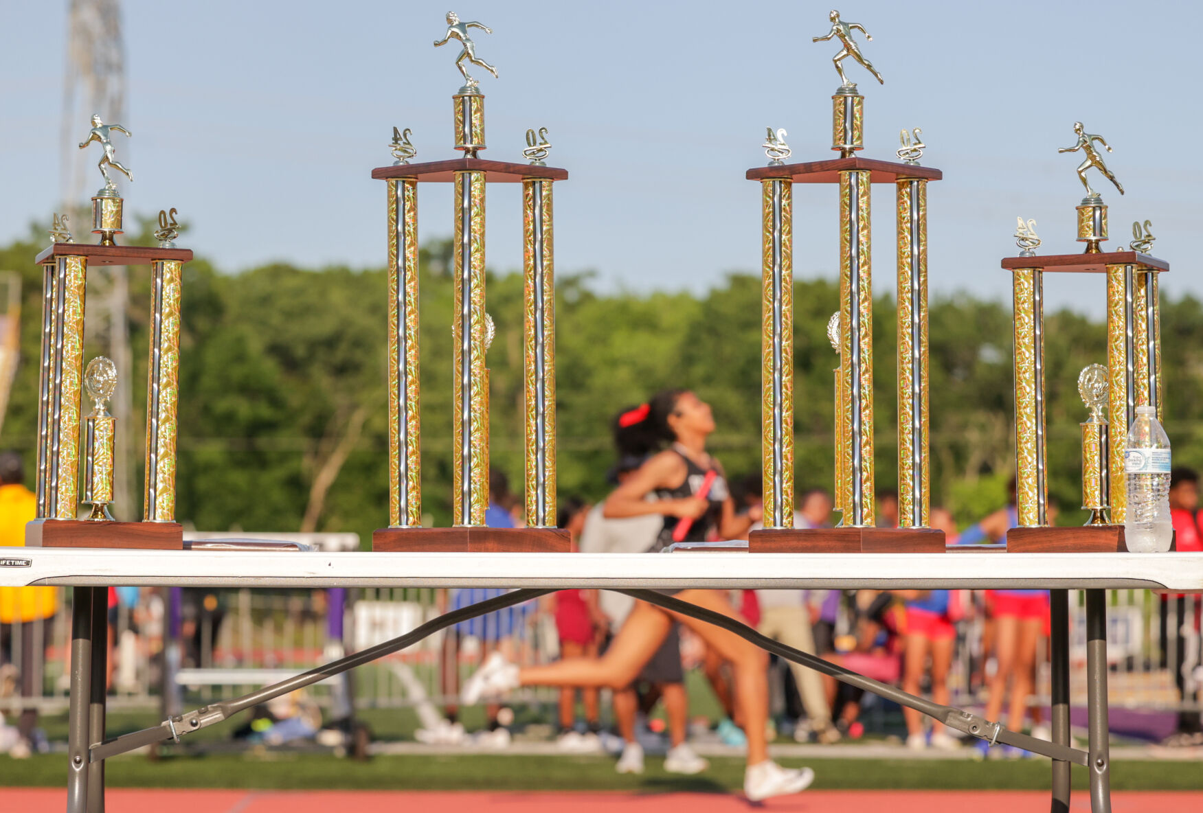 Jesuit and Mount Carmel win regional track and field team championships