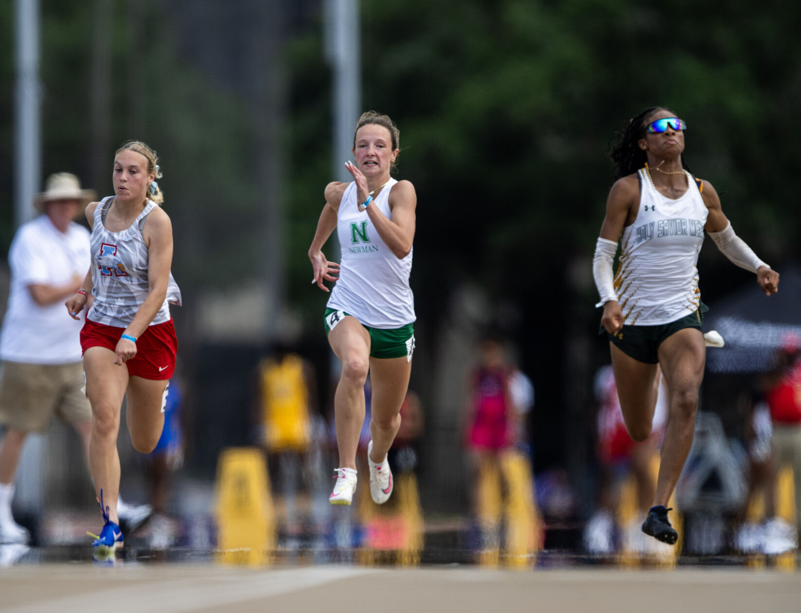 Two-event winners boost Newman girls to runner-up finish at state track and field