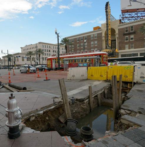 Sinkhole forms on Canal Street alongside ongoing construction, snarls traffic before temporary fix _lowres