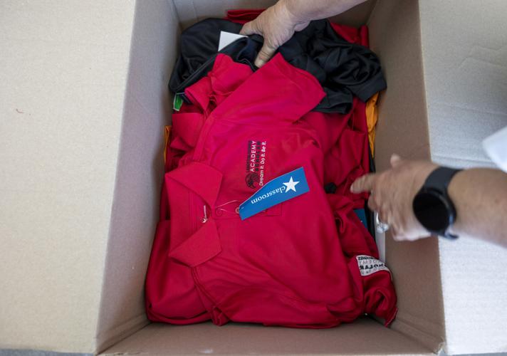 As more New Orleans families struggle to buy school uniforms, one group