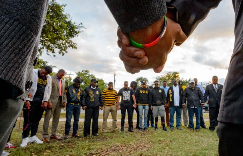AfricanAmerican fraternity holds prayer vigil at Jefferson Davis statue, calls for removal