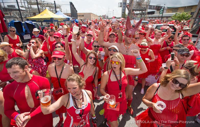 Red Dress Run turns 25 with another sudsy scurry through the French Quarter on Saturday