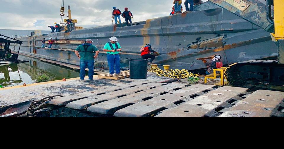 Photos, video: Crews prepare to sink barge in Bayou Chene to help with