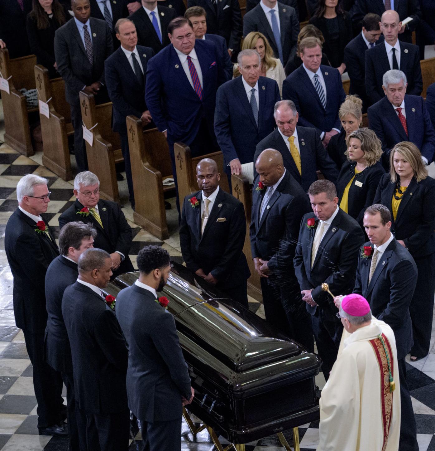 Pallbearers move the casket of former St. Louis Cardinals and