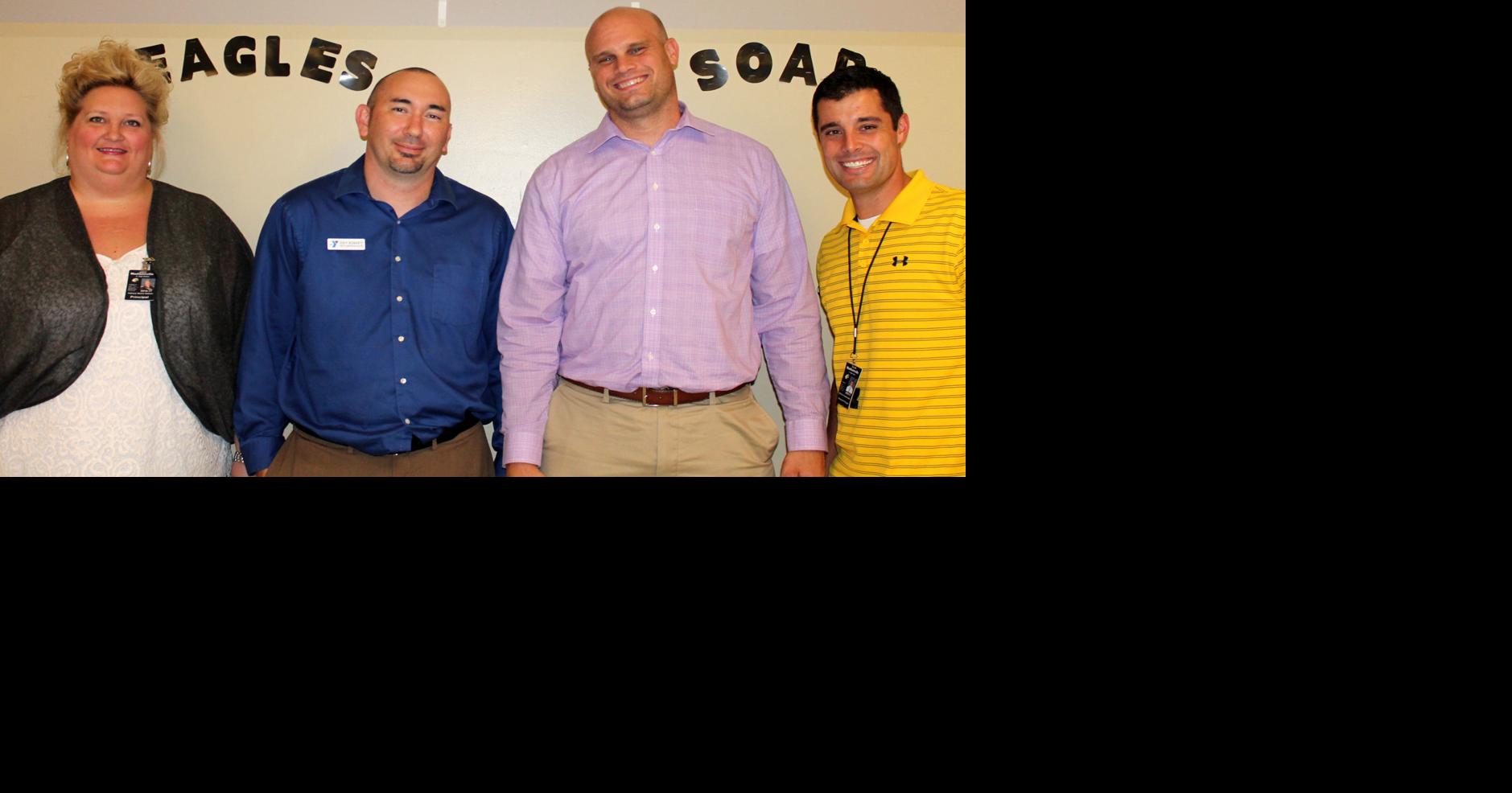 Madisonville Junior High School Eagle Dads group learns about YMCA