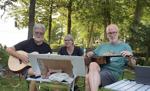Harvey Broussard at their annual singalong on Lake Champlain with Quebecois visitors in 2023.jpg