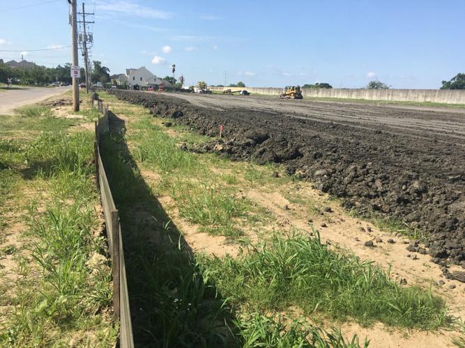 Dump trucks on Bellaire Drive for canal seepage fix to end Saturday