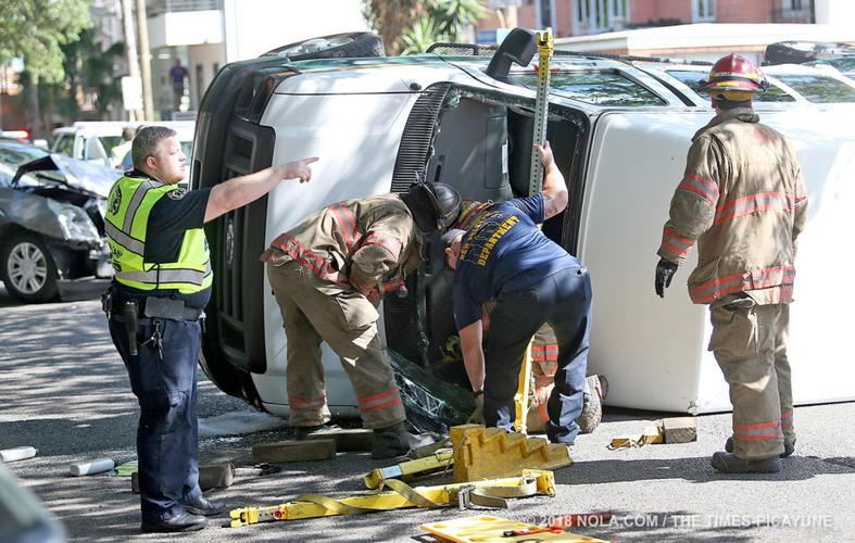 Medical transport van overturns in crash with SUV in Central City