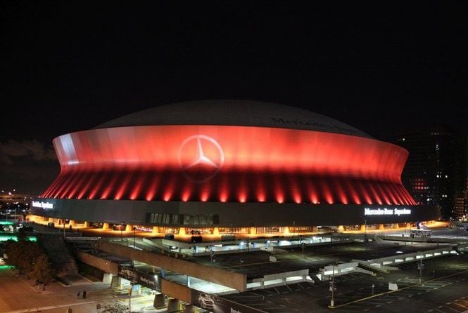 Superdome in Red - At night, Mercedes-Benz Superdome, the home stadium of New  Orleans Saints football team, is lit up by bright and colorful lights Stock  Photo - Alamy